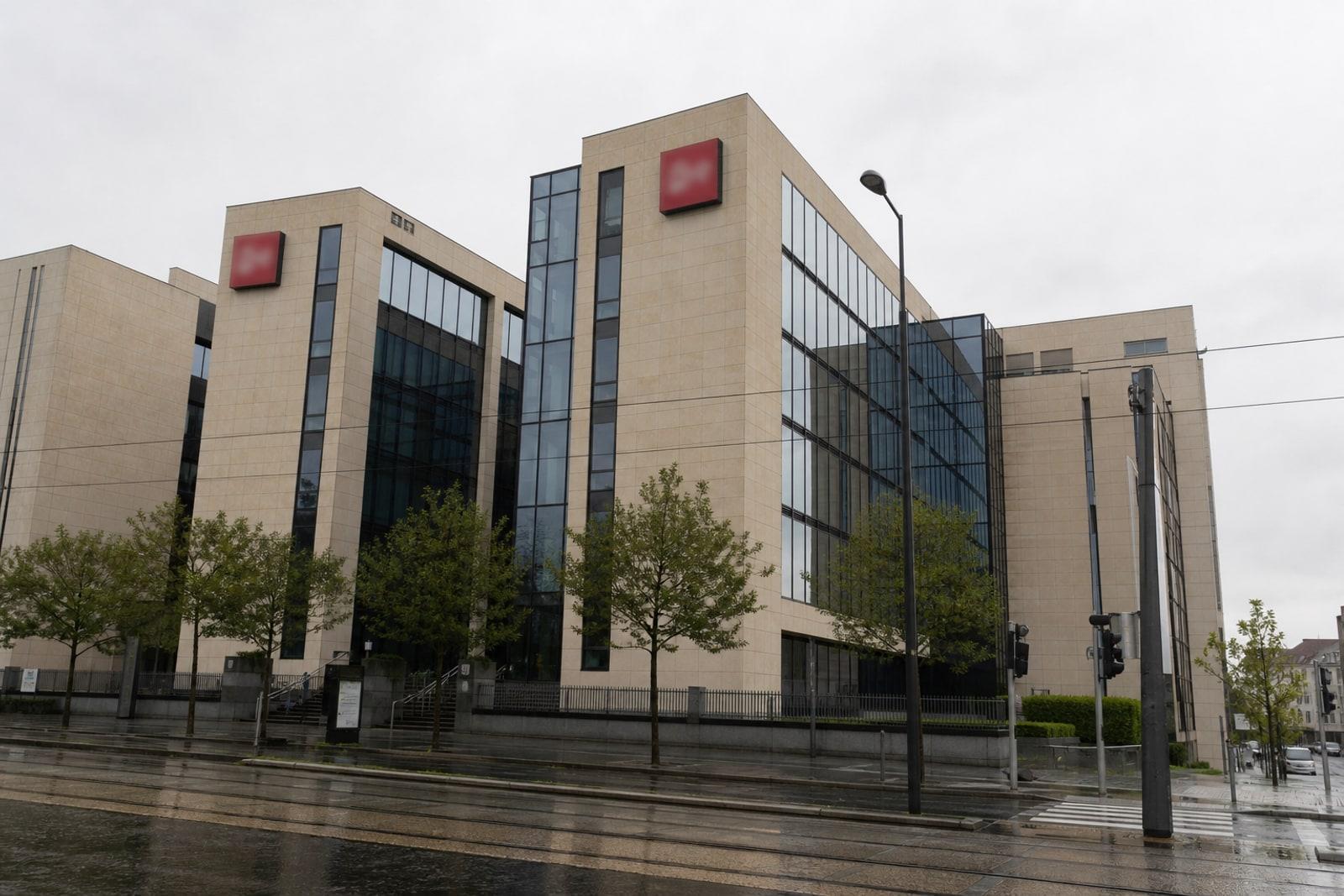 Headquarters of Banque Internationale à Luxembourg on route d'Esch in Luxembourg City, with the bank's red logo on the glass façade