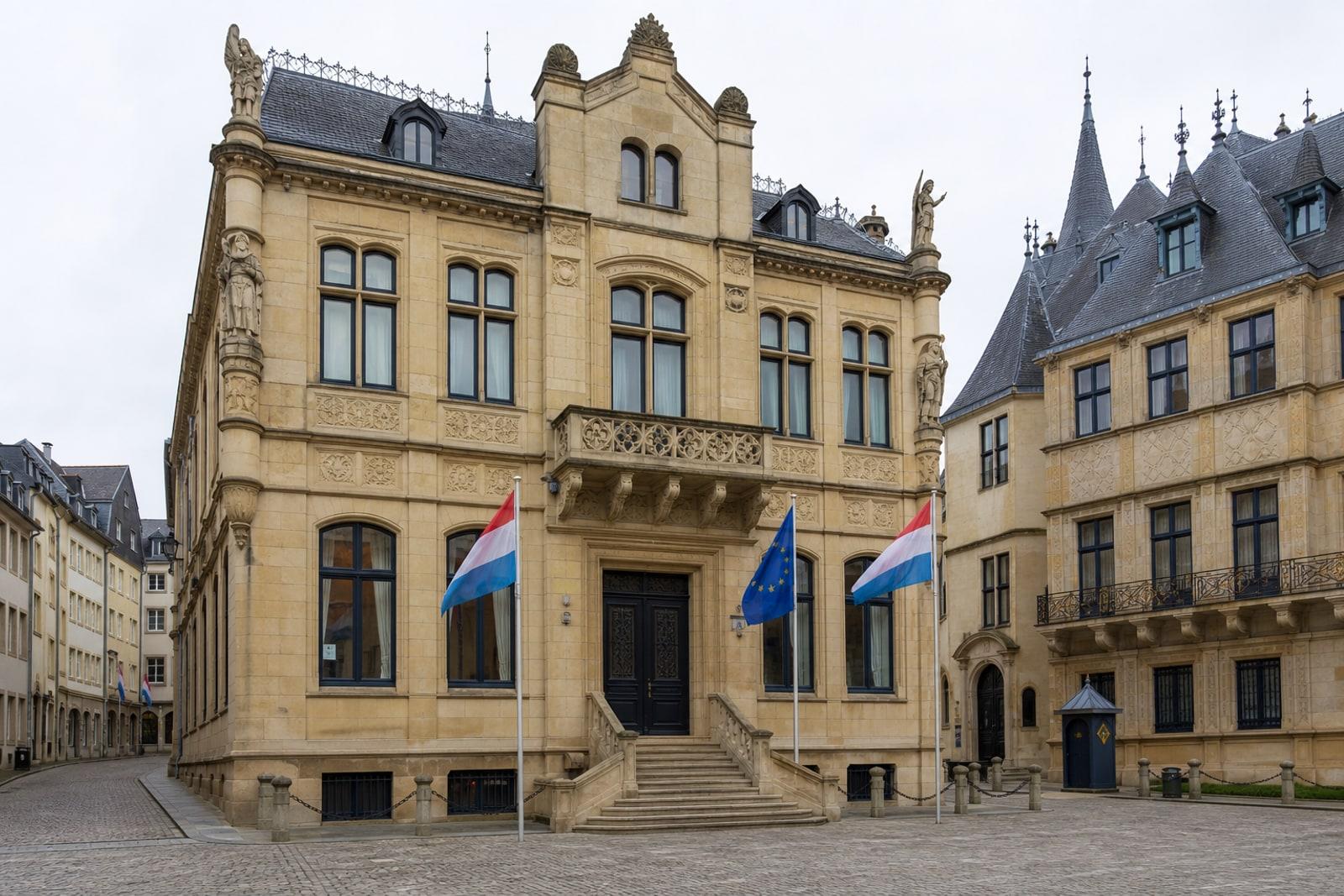 The ochre sandstone façade of Luxembourg's Chamber of Deputies parliament building in Luxembourg City's old town.